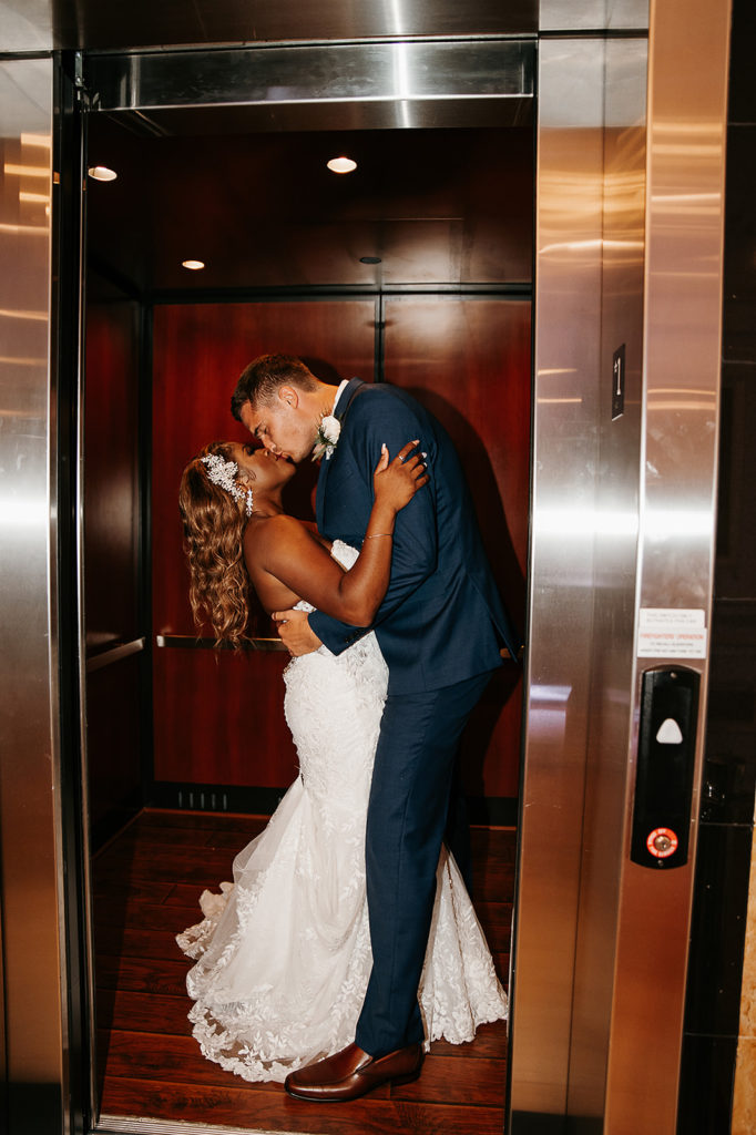 elevator photos with wedding couple