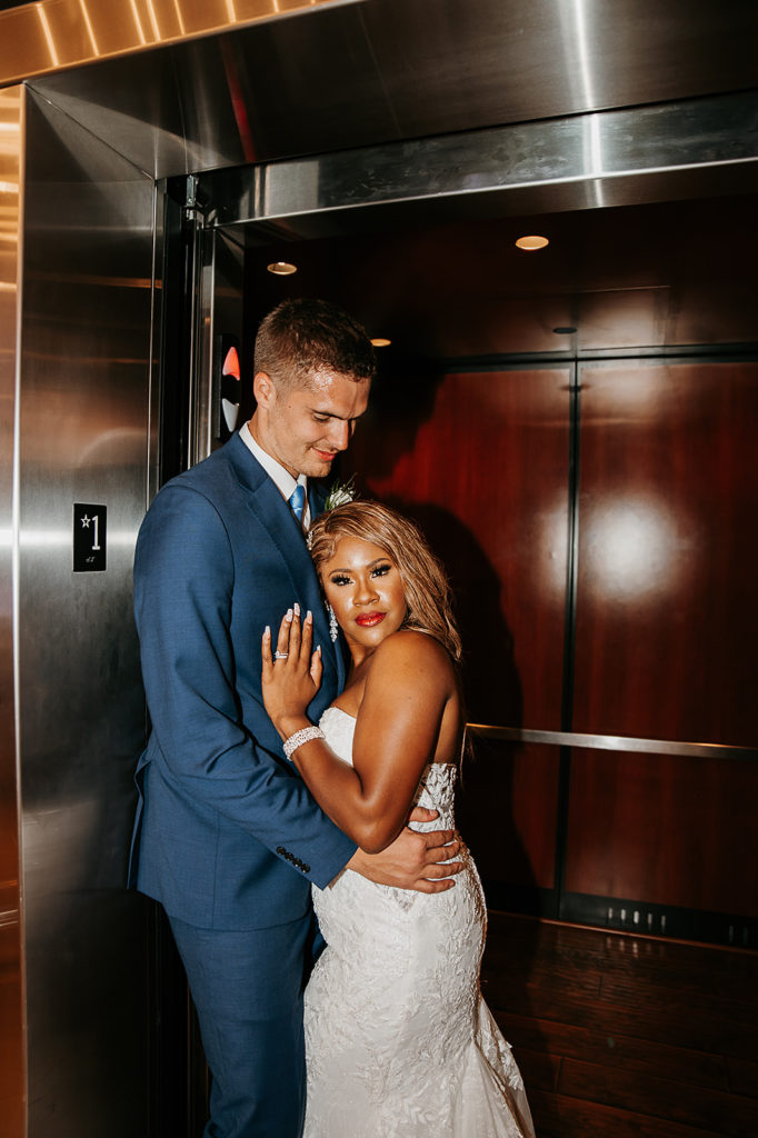 elevator photos with wedding couples