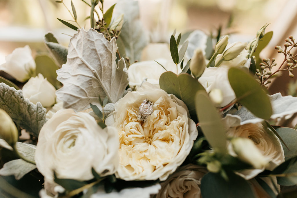 Wedding flowers with wedding ring inside