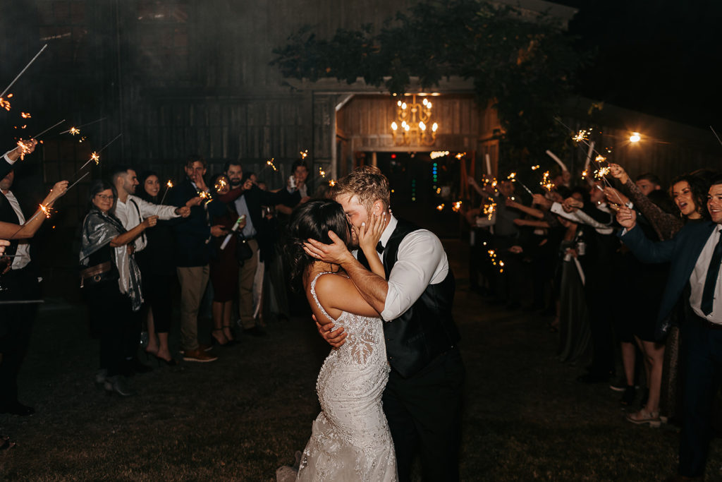 Bride and grooms sparkler exit 