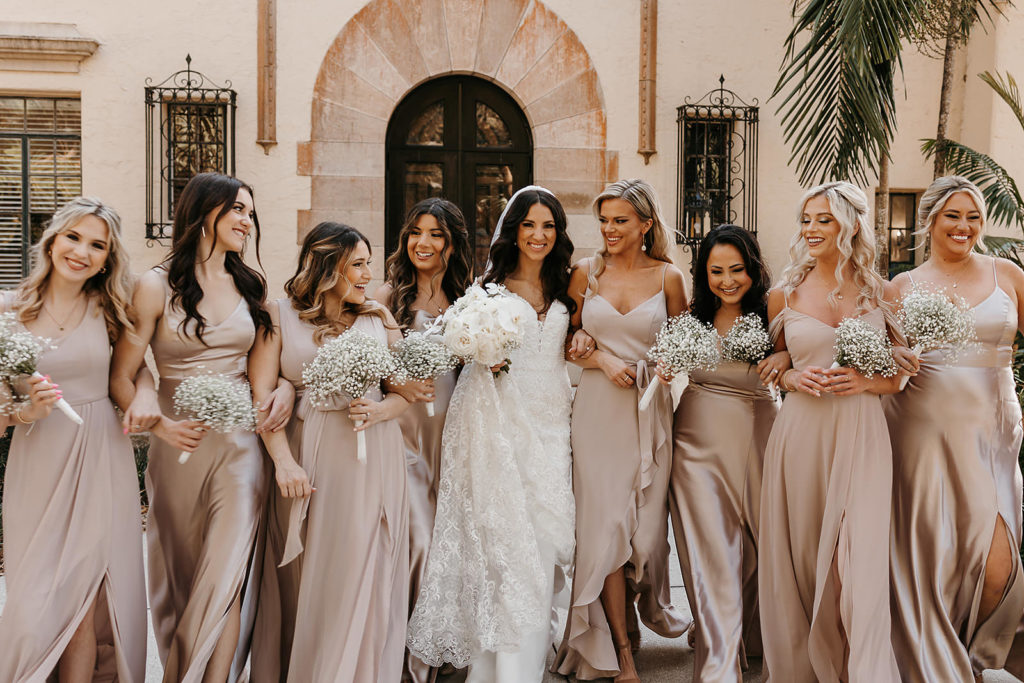 Bride and bridesmaids in champagne dresses